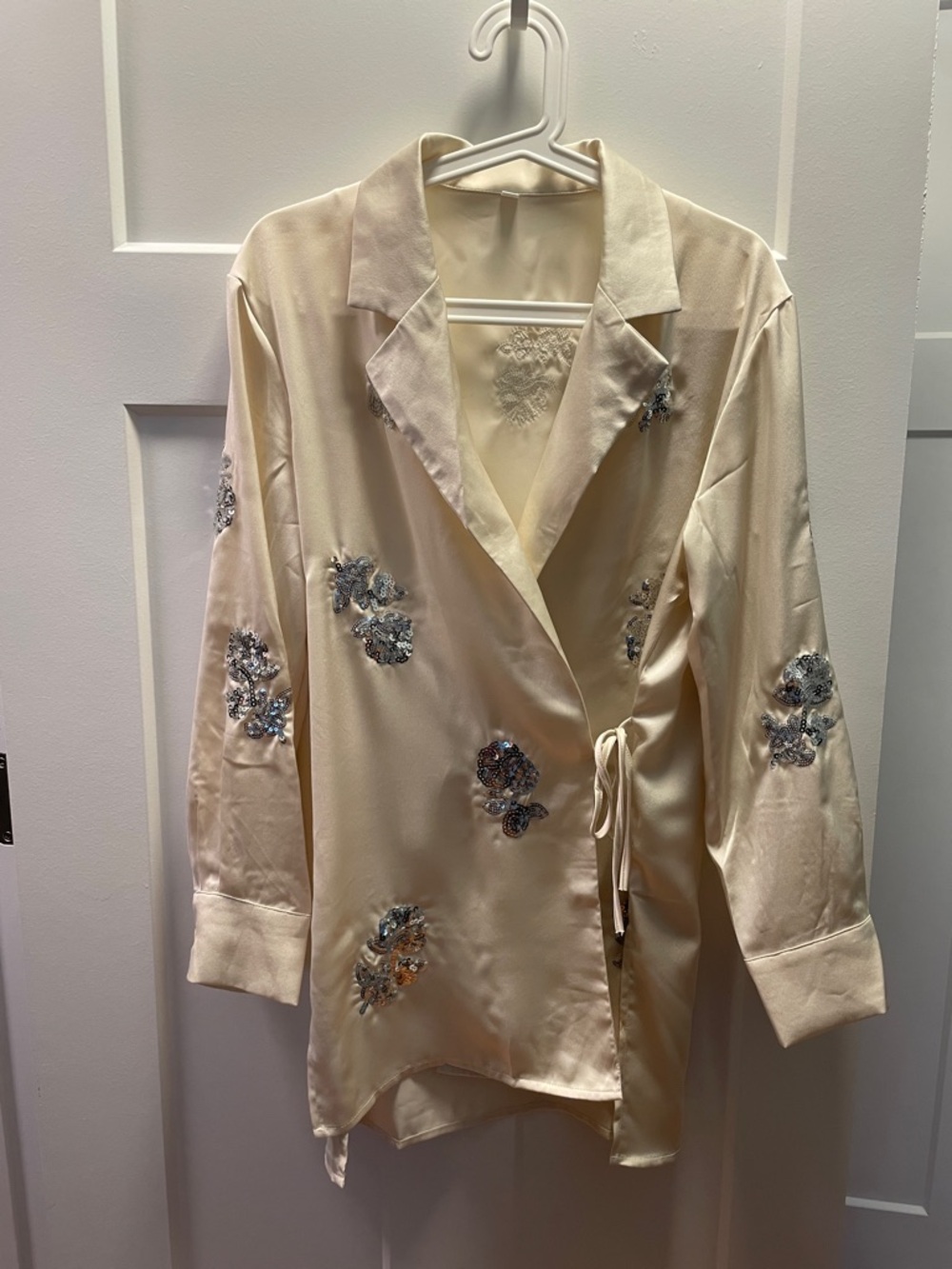 Commense Wrap Satin Blouse in Ivory with Silver Sequin Embellishment. Size M.